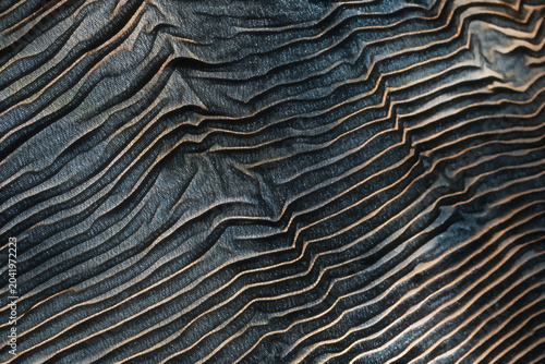 Macro of textile with ripple lines, texture background, studio shot photo