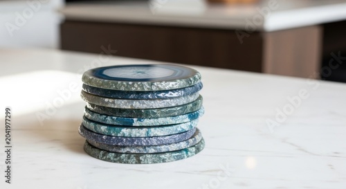 Stack of Polished Natural Agate Coasters with Distinct Veining on a Marble Surface