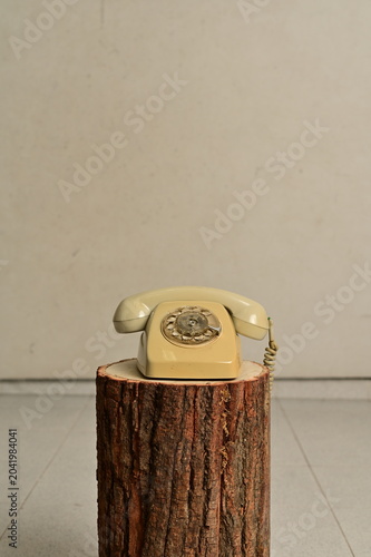 Bild auf Leinwand an old telephone with rotary dial