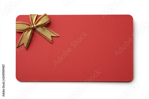 Gift card mock-up template. Red business card with gold ribbon bow accent. Prestigious blank voucher. Colorful coupon on white backdrop. Premium mockup, corporate reward, wedding favor layout. Flyer