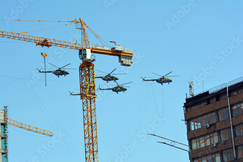 Military helicopter in the sky. Flying helicopters