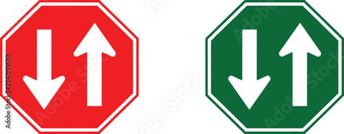 Foto Red and green octagon traffic signs with white arrows indicating two way movemen