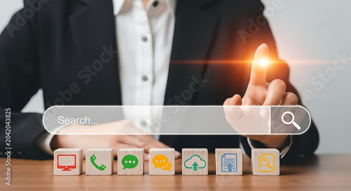 Hand selecting social media reaction emoji icons on wooden desk with laptop and warm lighting