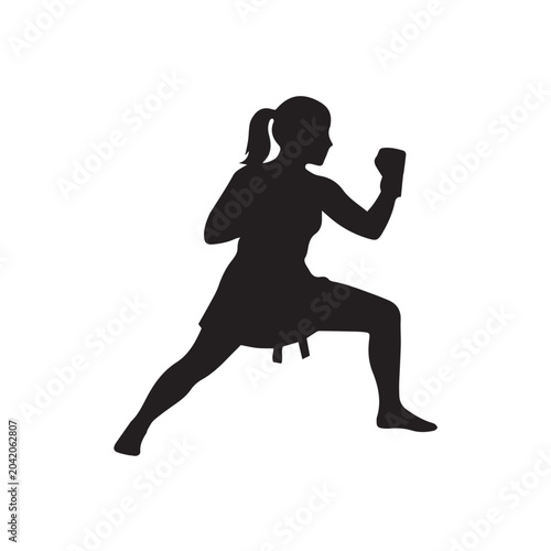 silhouette of a woman boxing