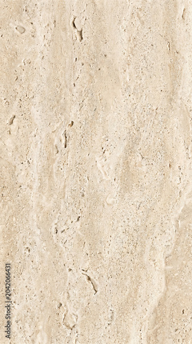Natural beige travertine stone texture background with porous details