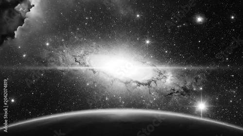 Epic Galaxy Rising Above A Distant Planet Against A Starlit Cosmos in Black and White
