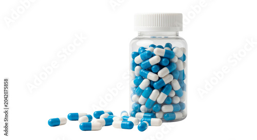 Clear Plastic Bottle Filled With Generic Blue And White Capsules On White Background