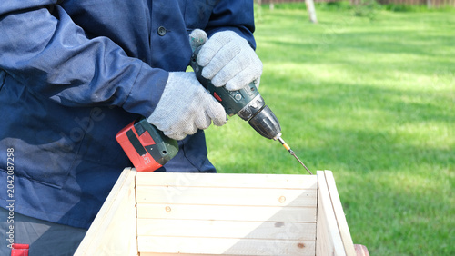 Konstfotografi Worker man working with Screwdriver