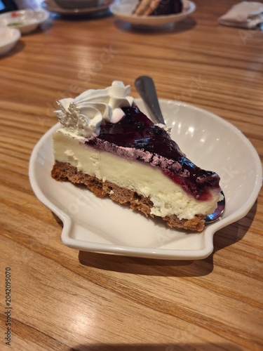 slice of cheese cake in a restaurant 
