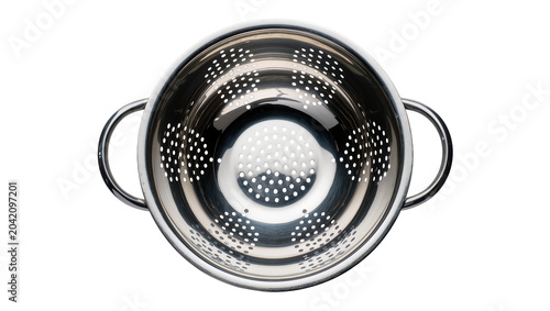 Fotografie Stainless steel colander with handles and perforated holes