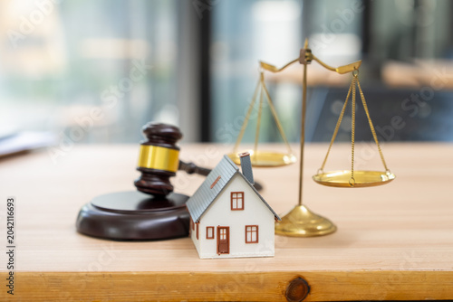 Legal proceedings involving real estate courtroom justice scale modern office professional perspective law concepts