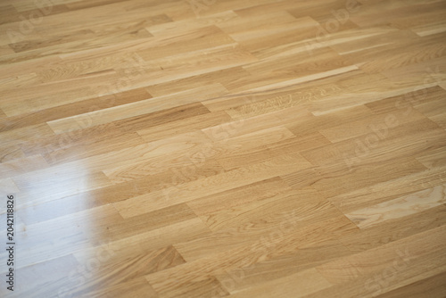 Fotografie Shiny freshly mopped hardwood floor