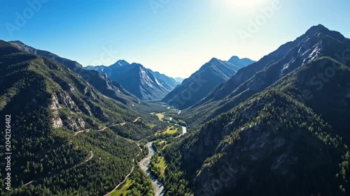 Breathtaking aerial views of a vast suburban neighborhood merging with majestic mountain scenery and lush valley landscapes.