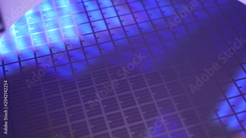 Silicon wafer for manufacturing semiconductor of integrated circuit.Electronic circuit designs have been built onto the wafers using micromaching including photolithography