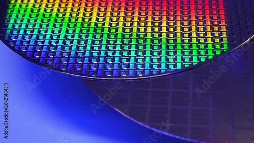 Silicon wafer for manufacturing semiconductor of integrated circuit.Electronic circuit designs have been built onto the wafers using micromaching including photolithography