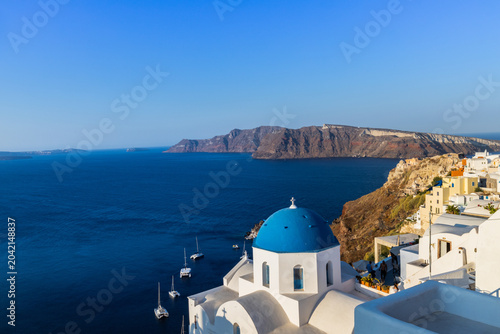 Photos Blue Domed Church in Oia, Santorini, Greece Overlooking Aegean Sea