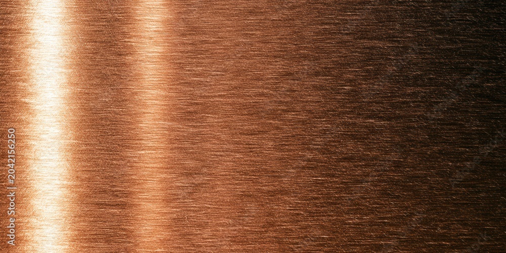 Fototapeta premium Copper surface shows fine lines and texture under light in a close view at a studio environment during the day