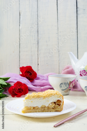 Freshly baked apple pie with smooth soufflé cream topping. Baked dessert with apples and a light creamy texture
