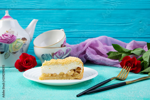 Freshly baked apple pie with smooth soufflé cream topping. Baked dessert with apples and a light creamy texture
