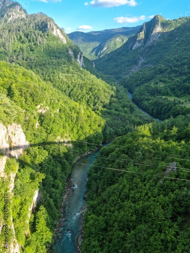 Bild auf Leinwand Looking down on a beautiful mountain river