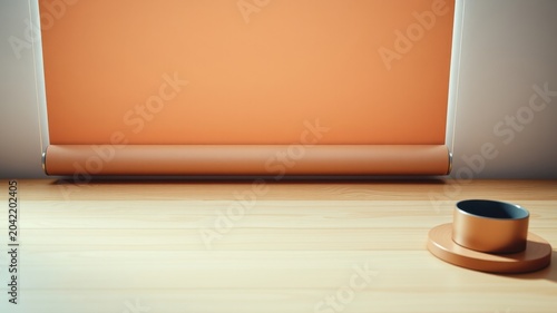 Minimalist interior design featuring a rolled-up peach-toned shade and a small, copper-colored container on a light wood surface