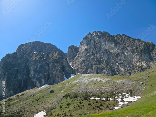Bilde på lerret Germany, Aggenstein summit rising beyond alpine meadows and lingering snow under