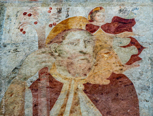 Cuadro en lienzo Fresco of Saint Christopher holding the Infant Jesus on his shoulders as he crosses the river