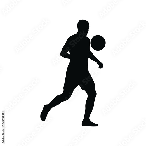 Bild auf Leinwand Silhouette of a male soccer player in motion, dribbling a ball during a game, ca