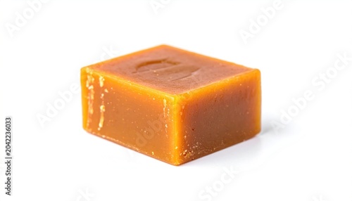 Delicious Caramel Candy Square on White Background.