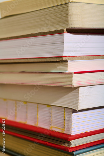 Literature books stacked on a library.