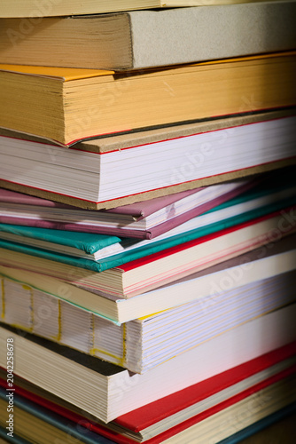 Literature books stacked on a library.