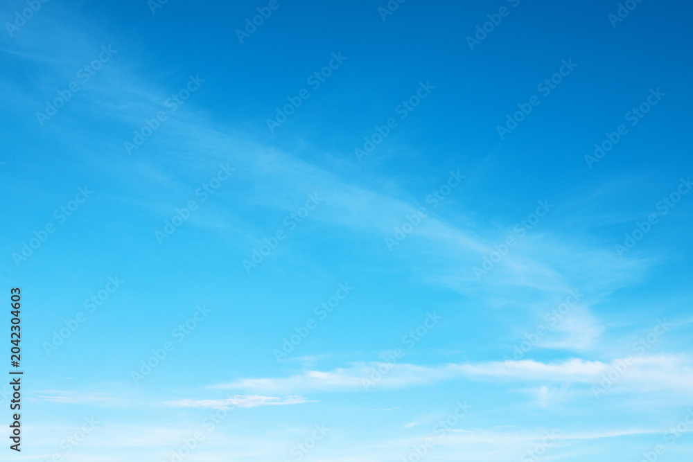 Naklejka premium azure sky with gentle traces of melting clouds as a background