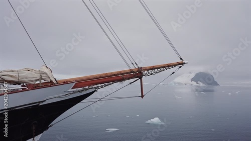 Wooden Bowsprit Over Calm Icy Sea