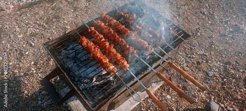 The famous Urfa liver dish, liver wrapped in flatbread with roasted chili peppers, onions, and sauce, is from Şanlıurfa, Türkiye. Grilled lamb skewers with liver. Grilled beef tenderloin, polis, lamb 