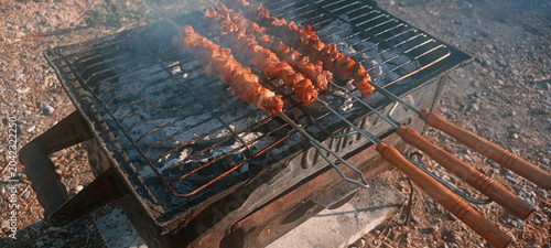 The famous Urfa liver dish, liver wrapped in flatbread with roasted chili peppers, onions, and sauce, is from Şanlıurfa, Türkiye. Grilled lamb skewers with liver. Grilled beef tenderloin, polis, lamb 