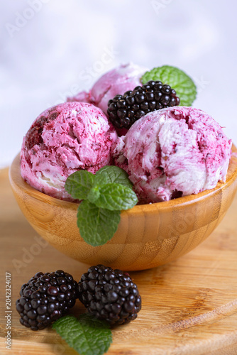 Delicious cream and blackberry ice cream.