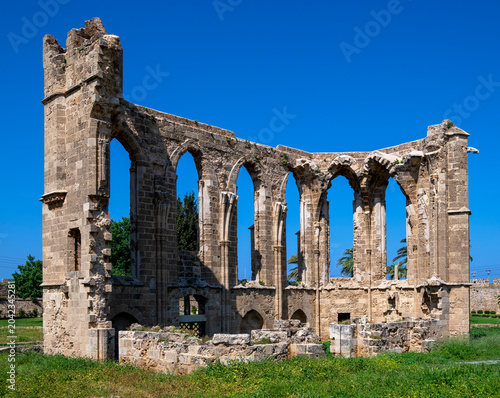 Ruins of the former Franciscan church in Famagusta, in the Turkish part of Cyprus, at sunshine and blue sky.