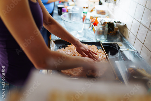 Slika na platnu Women's hands prepare a minced meat dish