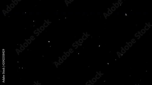 Filmgrain Overlay. White light particles scattered in a dark night sky star fieldperfect for backgrounds, science fiction designs, and celestial concepts.