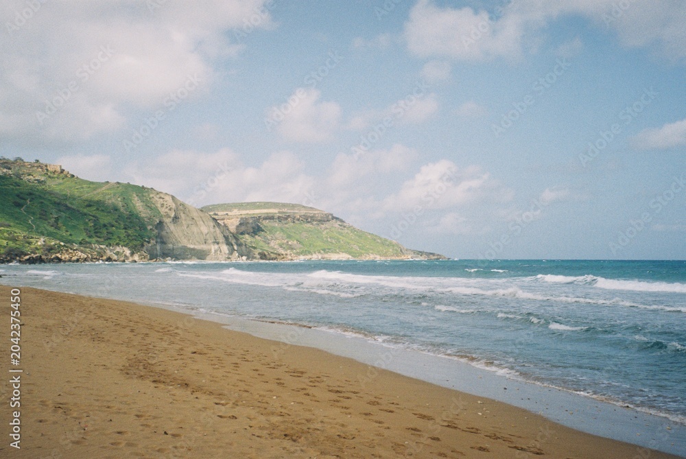 Fototapeta premium Ramla Beach on Gozo Island, Malta, Mediterranean Coast, Film Photography