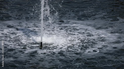 Water Fountain Shooting Into Air With Ripples Below