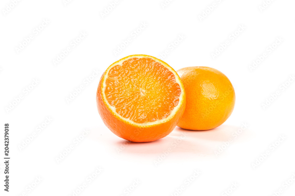 Fototapeta premium Fresh Orange Halves on White Background - Studio Food Photography