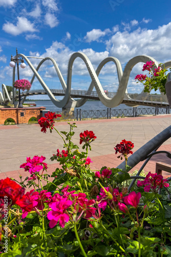 The Pedestrian Wave Bridge in Kyiv, Ukraine stretches elegantly across the water, combining modern design with functional urban connectivity.