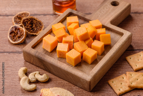 Fotografía Hard yellow cheddar cheese for sandwiches or pasta