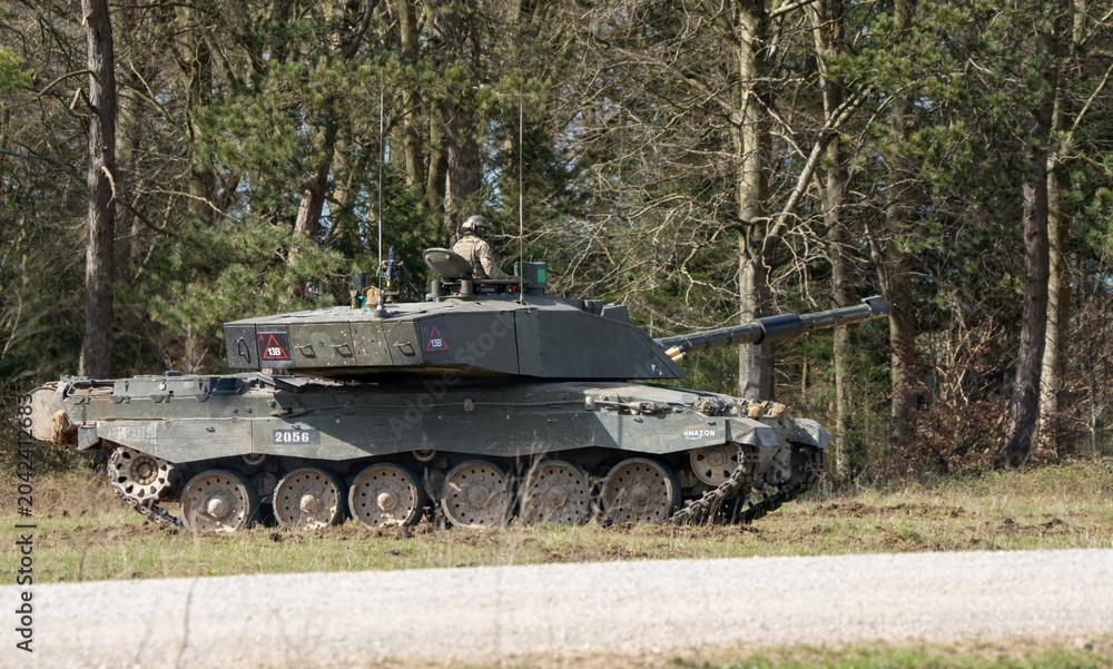 Obraz premium British army CR2 FV4034 Challenger 2 II main battle tank in action on a military exercise