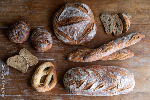 Assorted artisanal breads on table