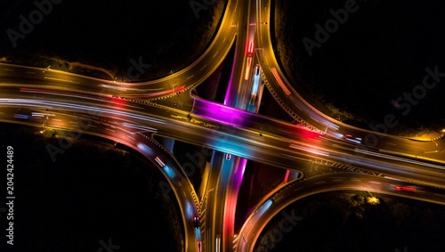 Photography Stunning drone aerial of a major urban road junction at night with spectacular m