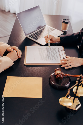 Konstfotografi Justice lawyer meeting with contract papers and Judge gavel on tabel in courtroom