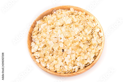 Foto Cereal Flakes in Wooden Bowl - Healthy Breakfast and Nutritious Meal