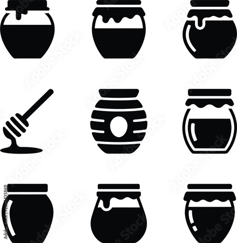 Black of honey jars and dipper